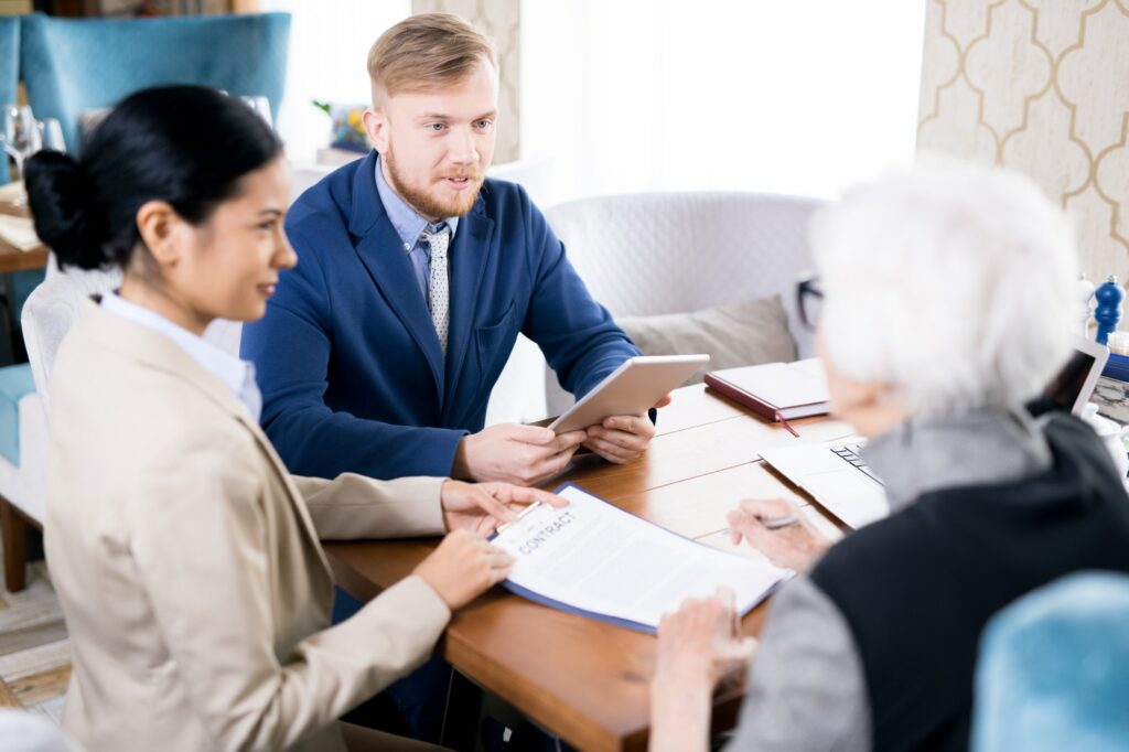 insurance-agents-with-senior-woman.jpg